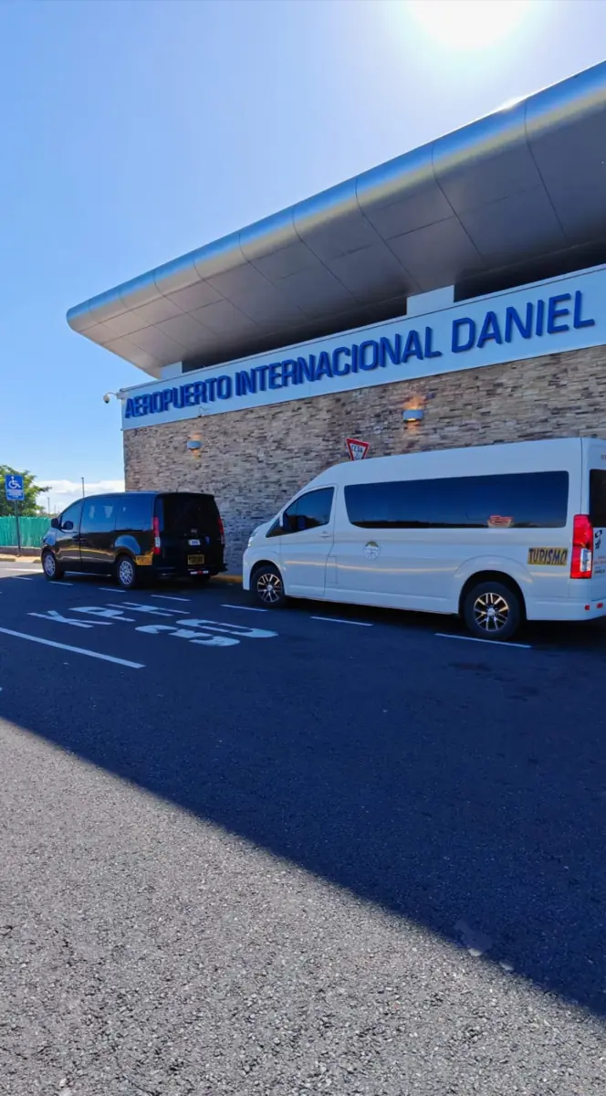 Tropical Experts vans outside Daniel Oduber International Airport in Liberia