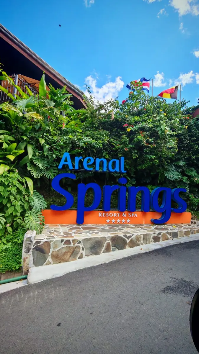 Arenal Springs Resort & Spa sign at the entrance